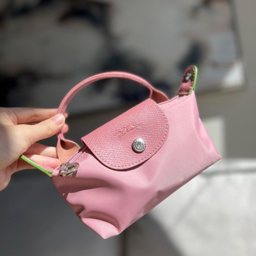 Mini Bolsa Champ - Compacta e Versátil com Alça Ajustável